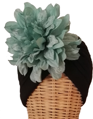 Turbante Dalia negro. Turbante de tela elástica plisada en color negro con una maxi flor en color verde agua : PVP 50 euros